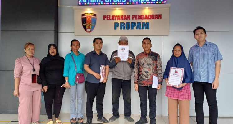 Kuasa hukum korban, A. Rilo Budiman, S.H., M.H., CPCm, dan tim saat membuat laporan di Propam Polda Sumsel, Jum'at (6/3/26).