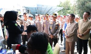 Irjen Pol Sandi Nugroho didampingi Kapolrestabes Palembang, Kombes Pol Sonny Mahar Budi Adityawan, dan Wako Palembang, Ratu Dewa saat meresmikan Kedai ADO Presisi, Selasa (5/5/26). Fhoto: Istimewa